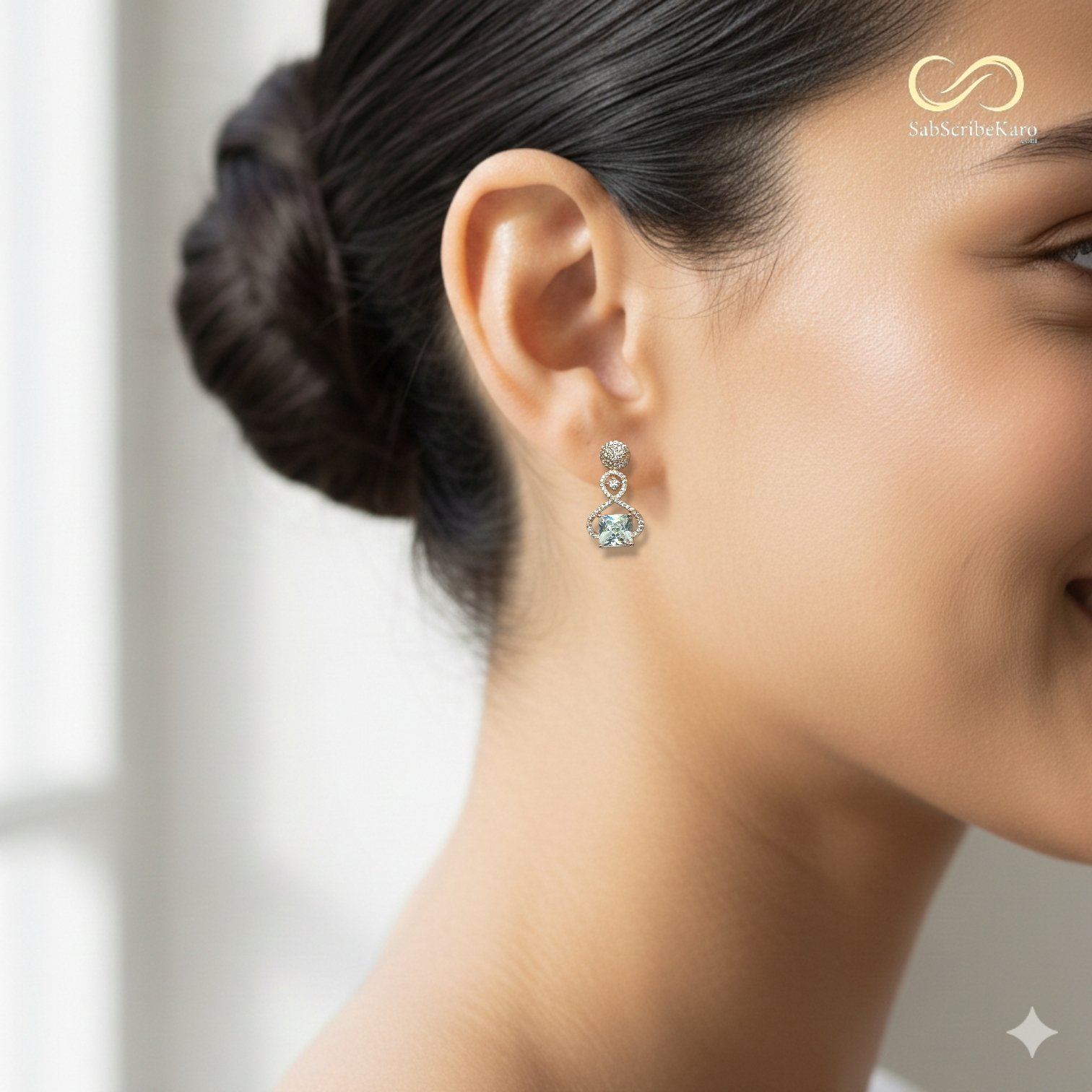 Rose Gold Infinity Knot Cubic Zirconia Dangler - Image 2