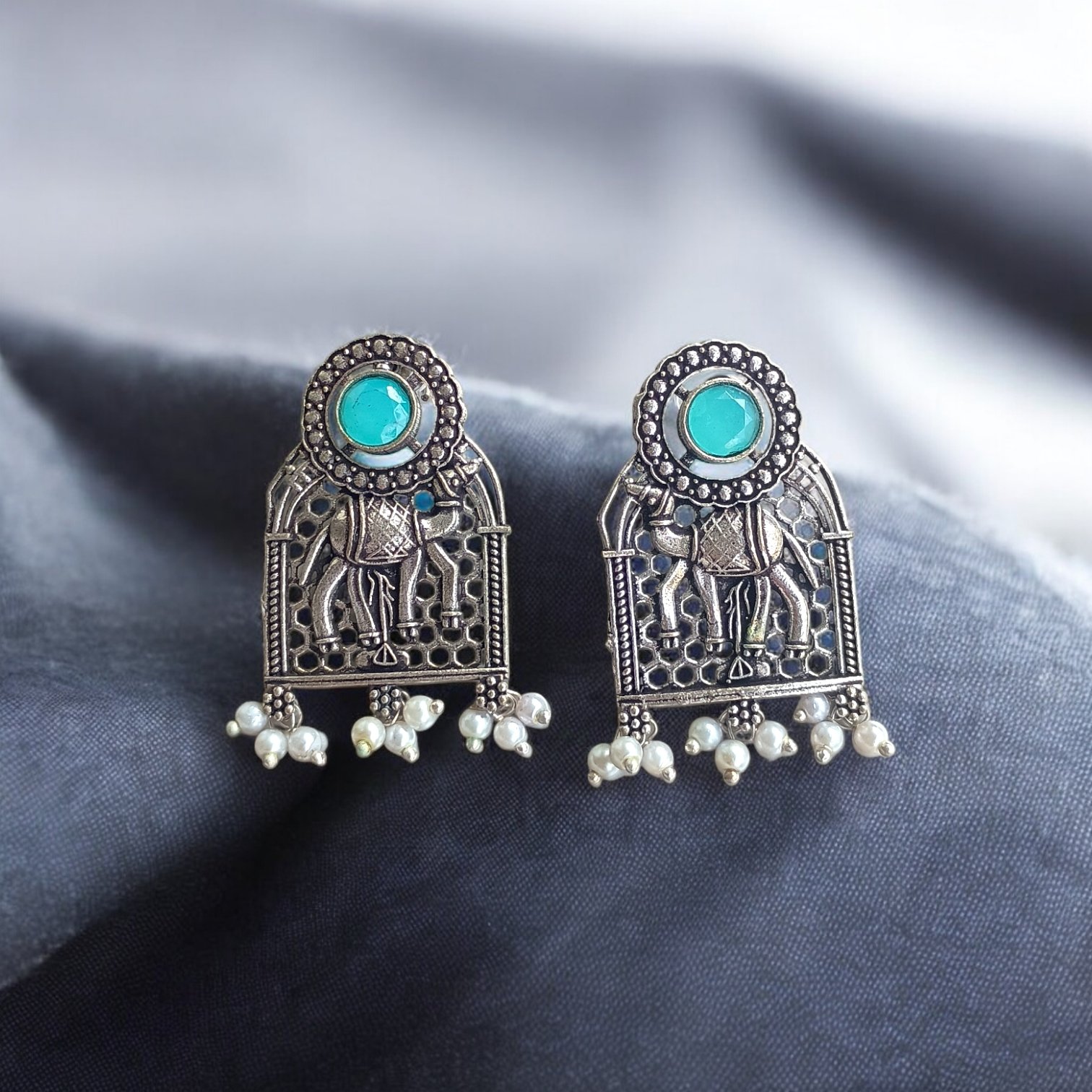 Traditional Elephant Arch Dangler with Turquoise Stone